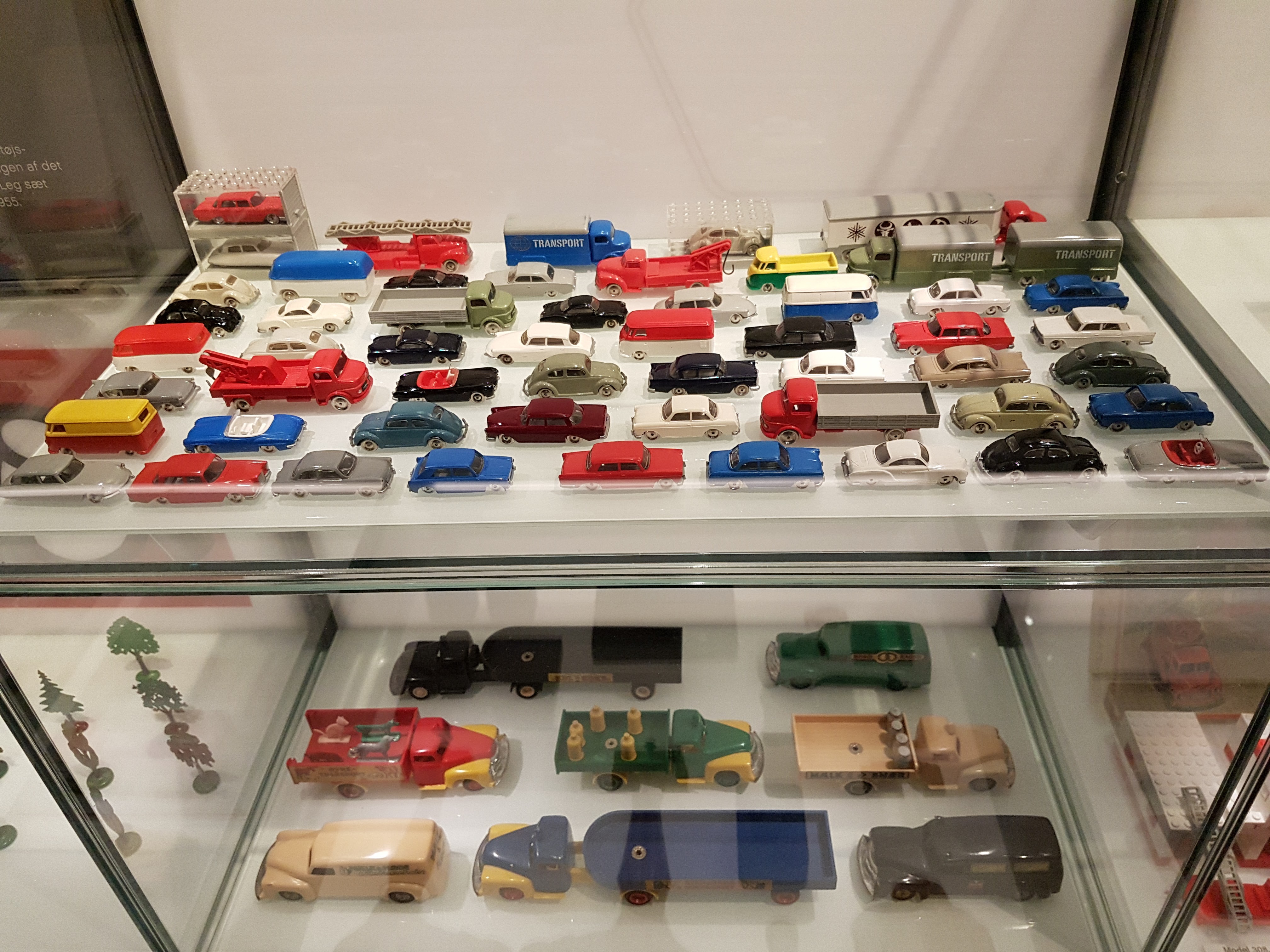 Various Lego cars displayed in the Lego House